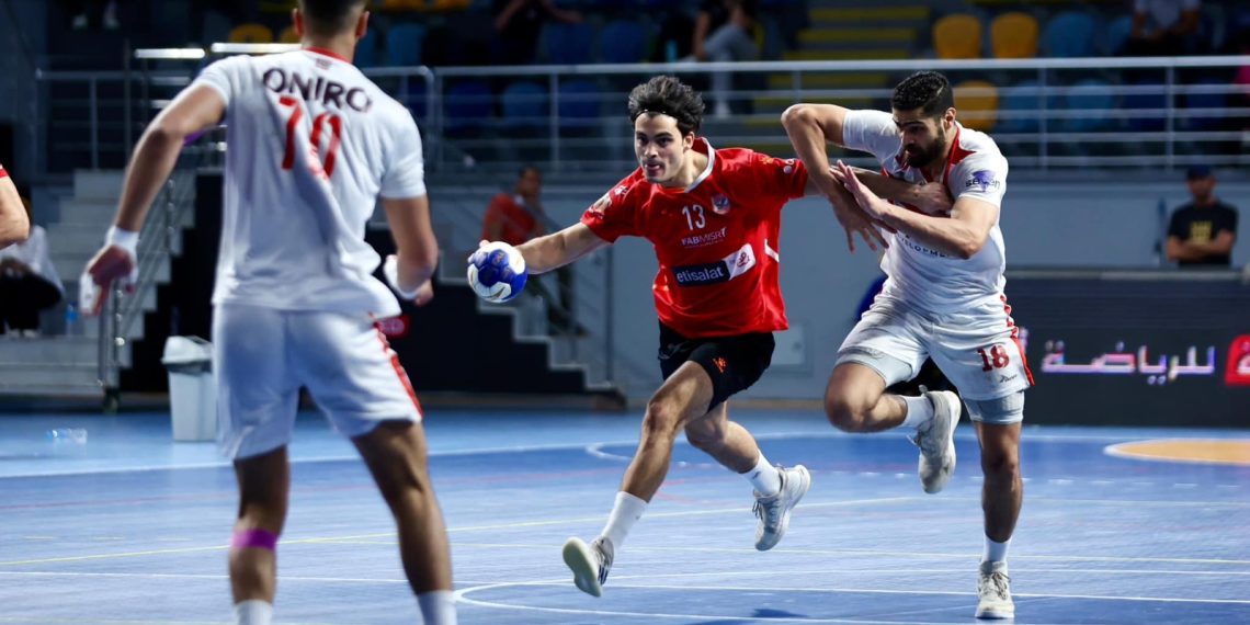 “تتويج رجال يد الأهلي بلقب الدوري بعد فوزهم على الزمالك في المباراة الحاسمة”